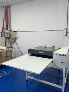 Máy ép keo Haixima căn biên cơ